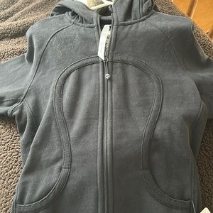 Black size 12 Lululemon sweatshirt with fur brand new